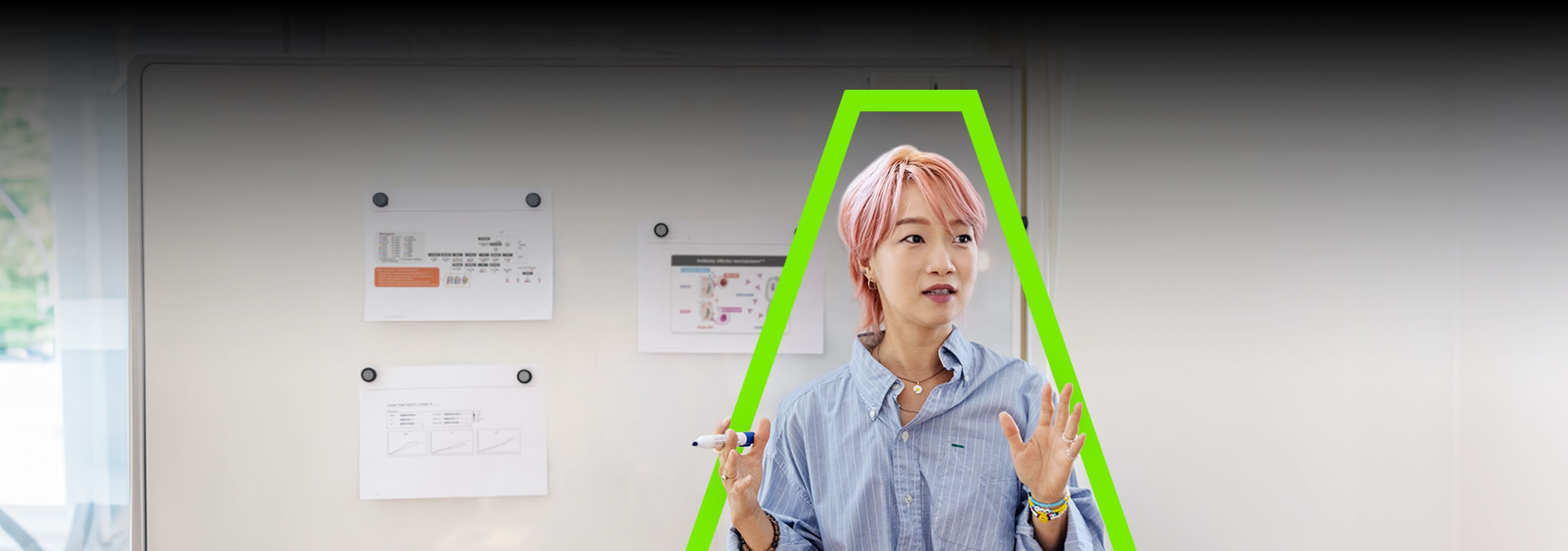 A woman presenting to an audience